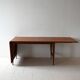 Vintage teak table by ISA Bergamo with drop-leaf extensions