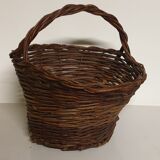Rustic basket made of raw wicker