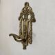 Brass coat hooks in the Napoleon III style.