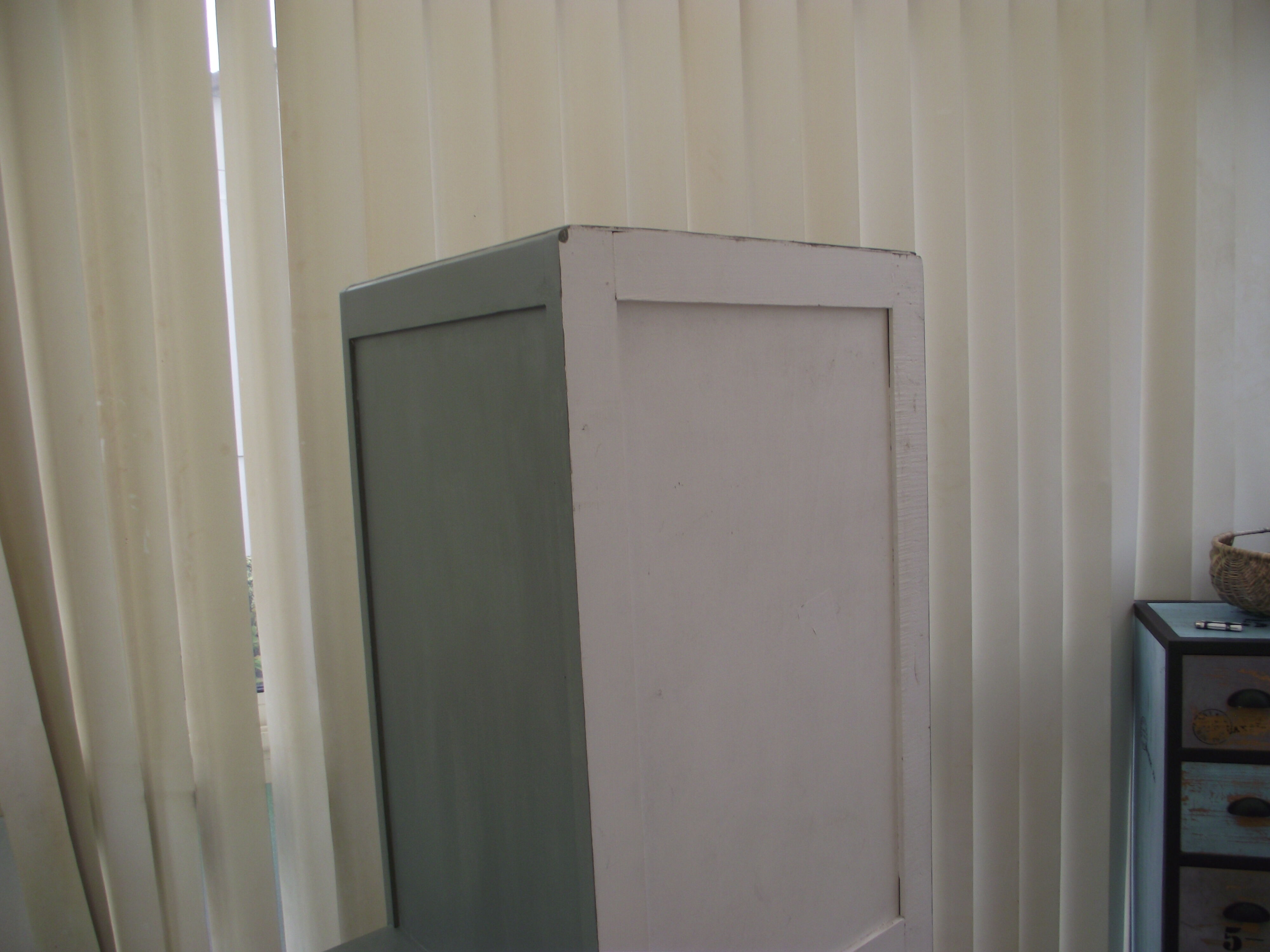 Asymmetrical cabinet from the 50s