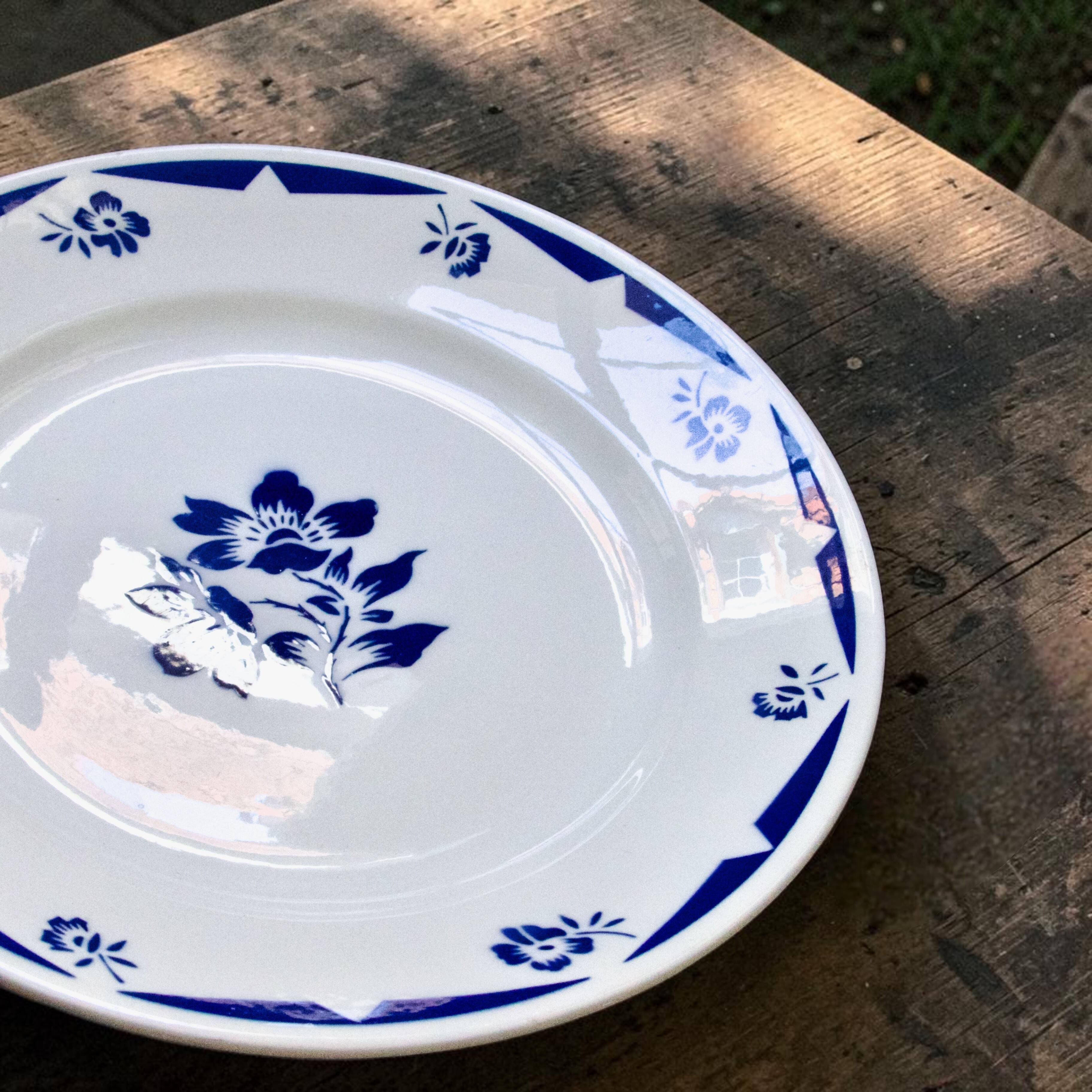 Round antique plate signed Badonviller collection "Madelon" hand-painted.