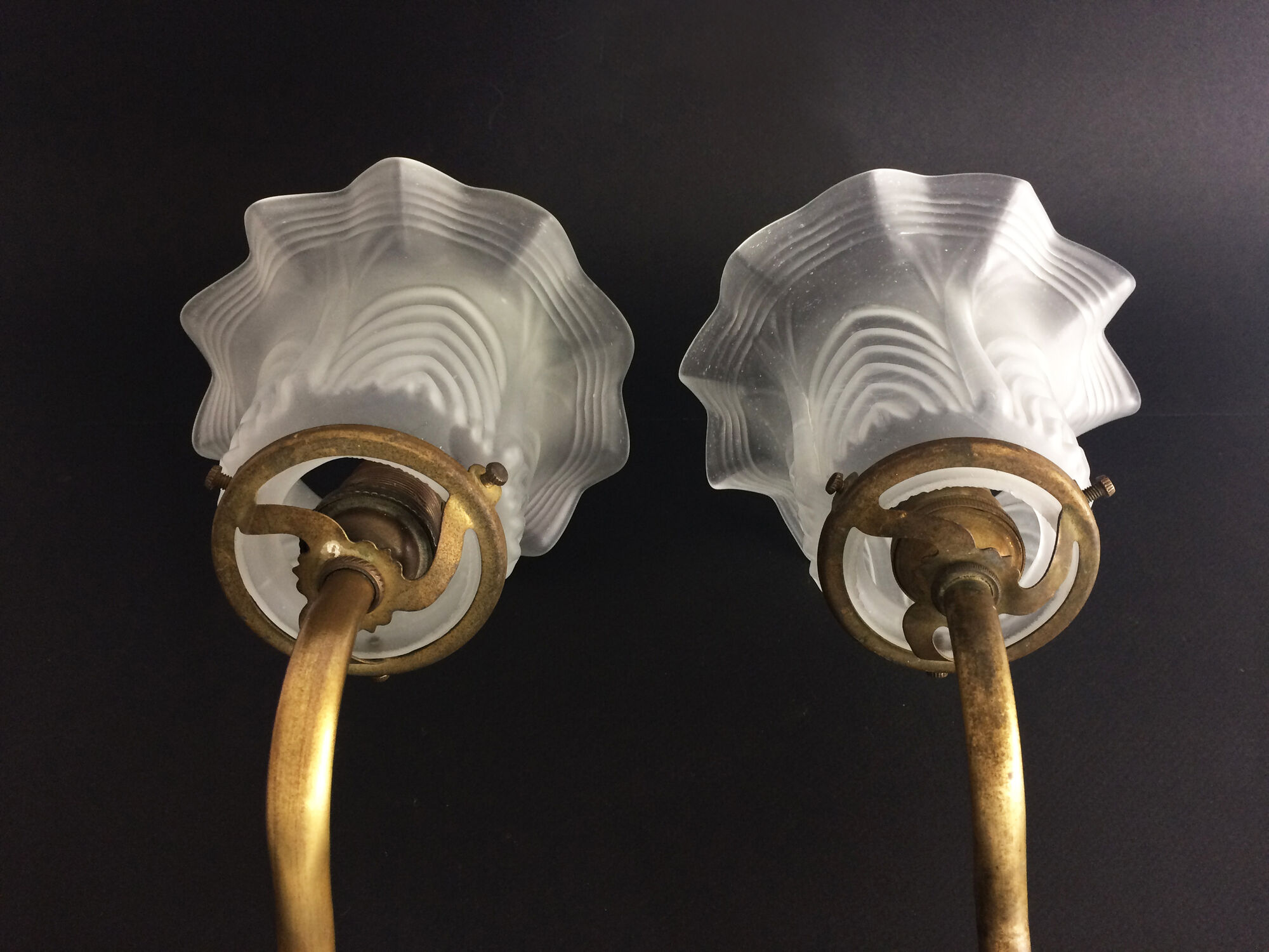 Pair of brass swan collar wall sconces, porcelain fastening. Vintage