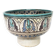 Cup on a ceramic pedestal – blue and turquoise geometric design.