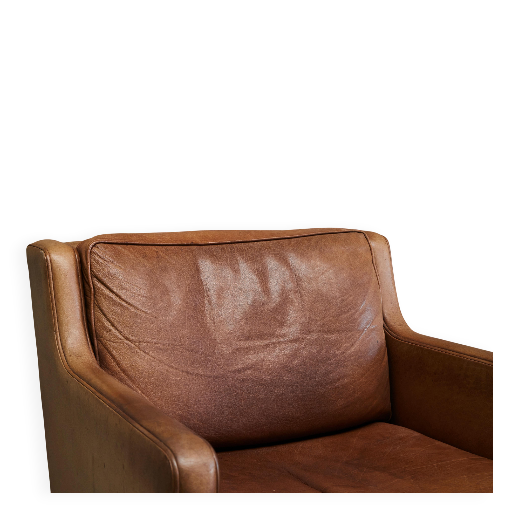 1970s patinated leather Scandinavian lounge chair