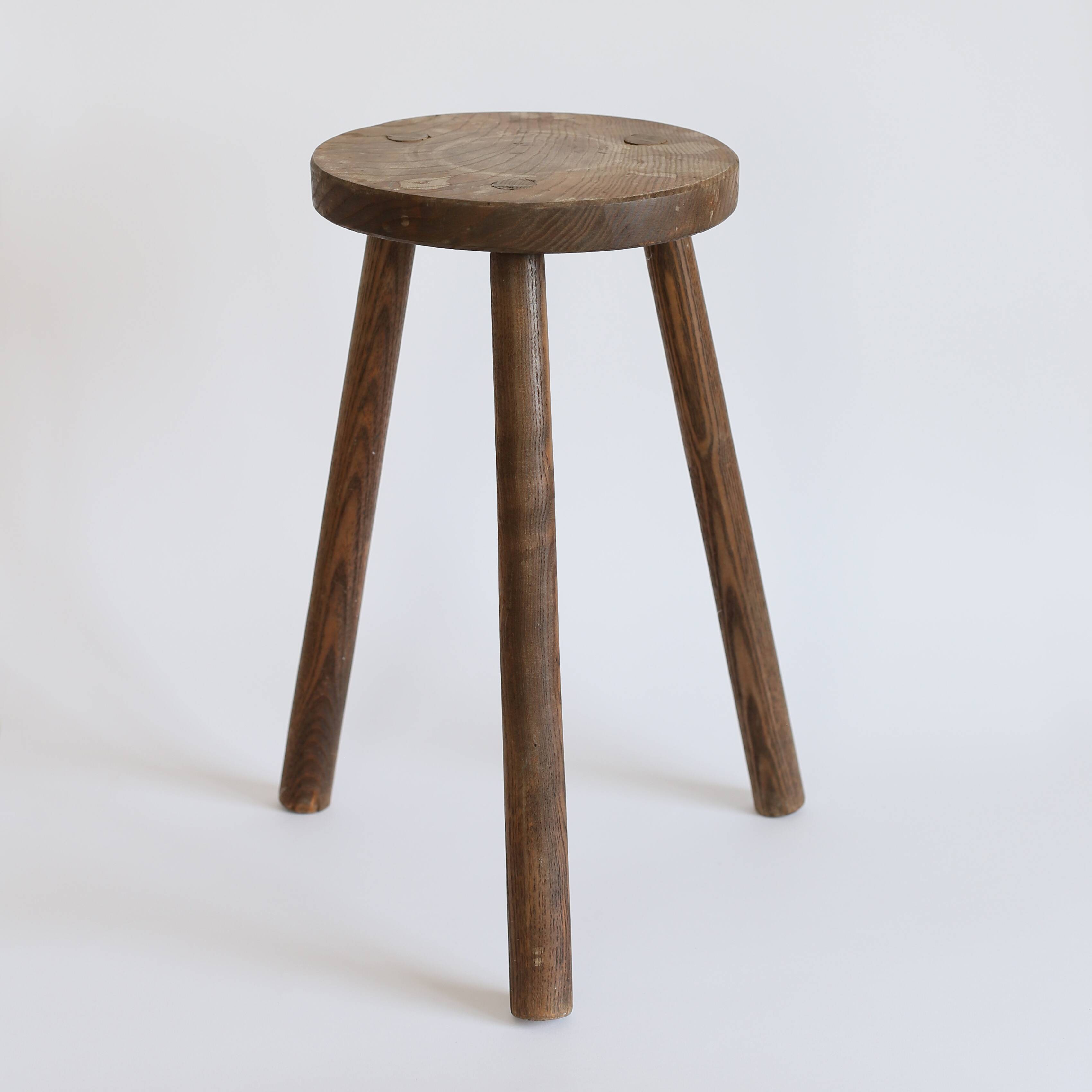 Wooden tripod stool