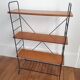 Floor on wooden and metal stand