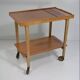 Vintage rolling bar or serving trolley, red ceramic, 1950s design
