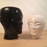 2 black and white ceramic head vases, face