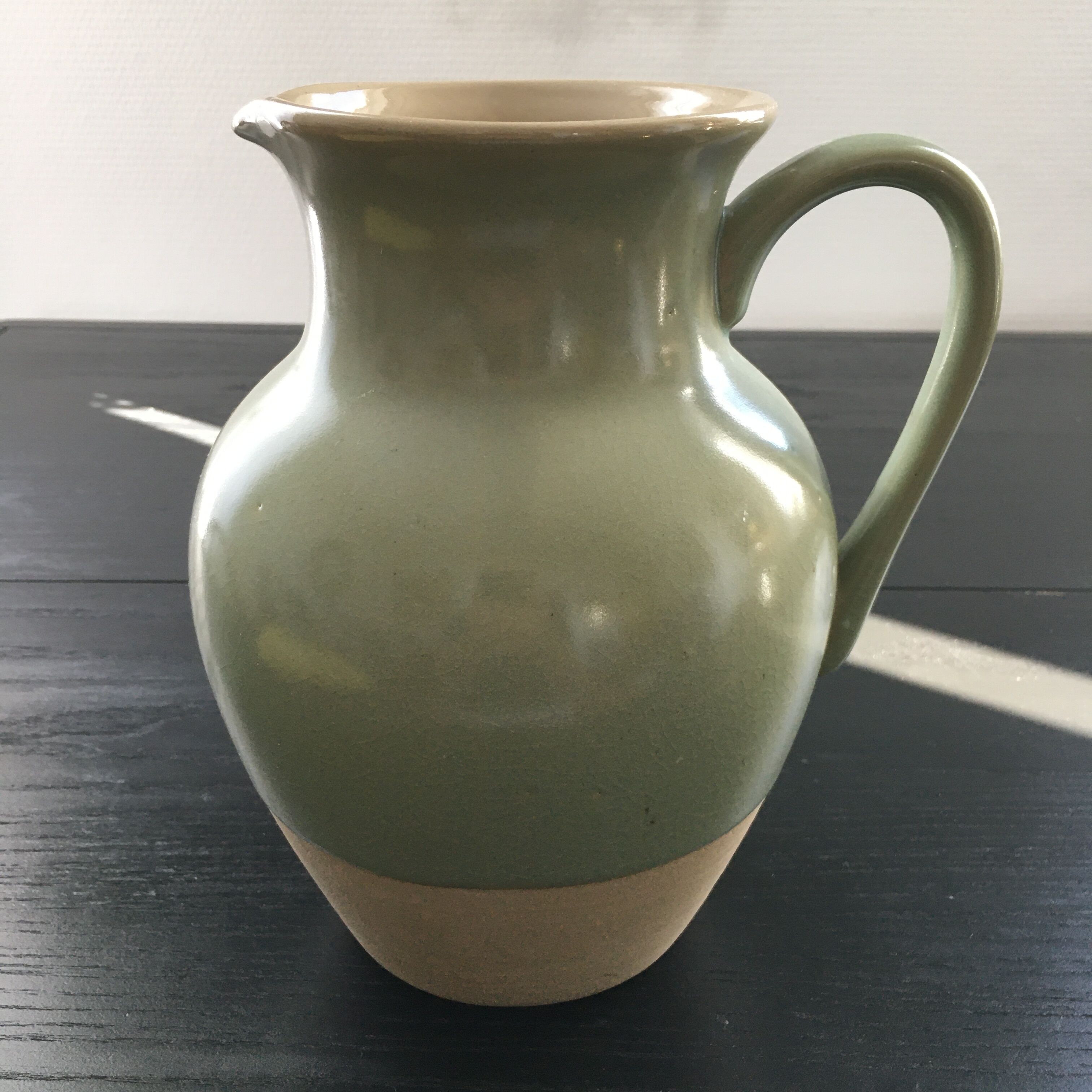 Two-tone almond green pitcher