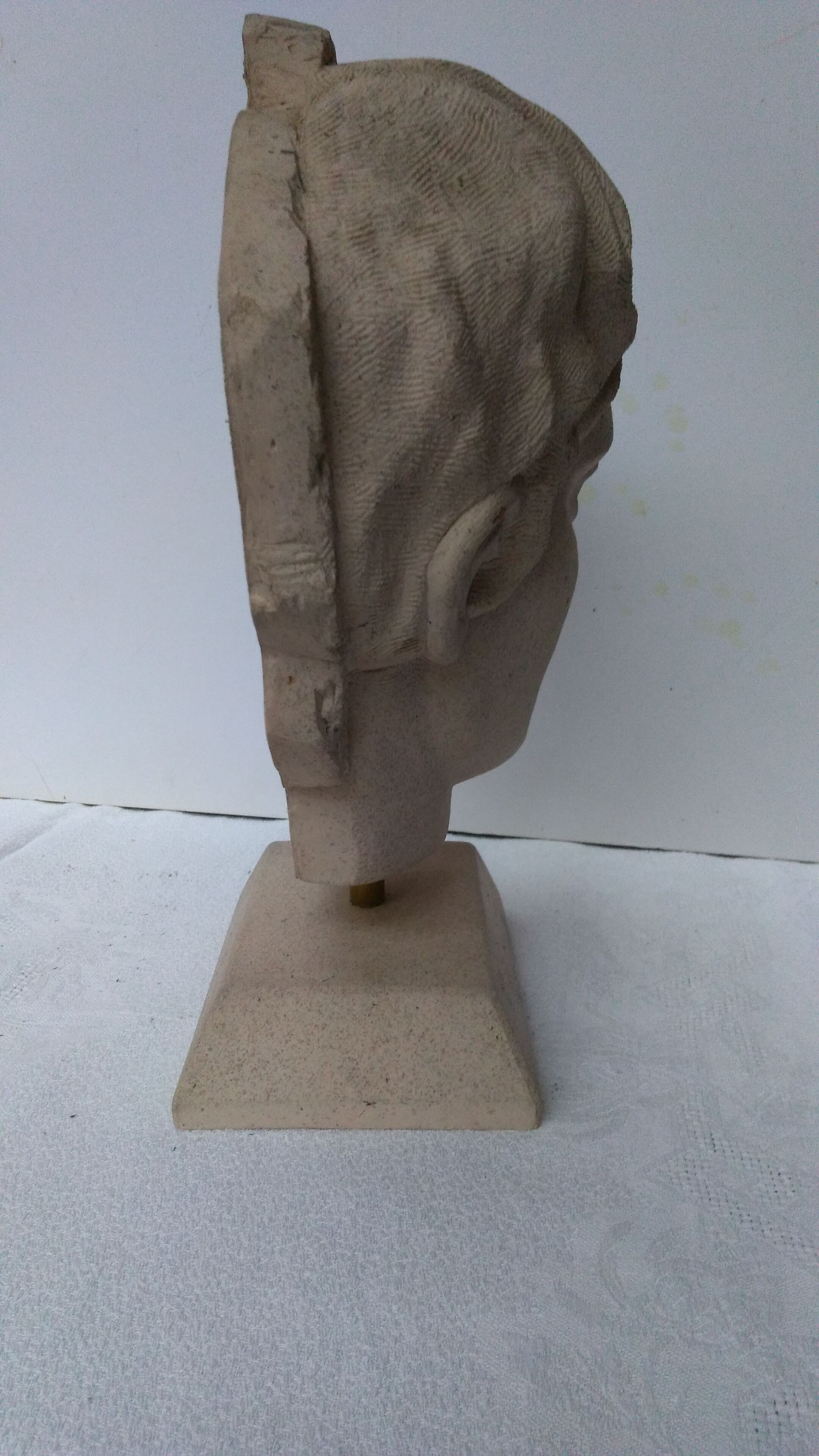 Ephebe head in sandstone