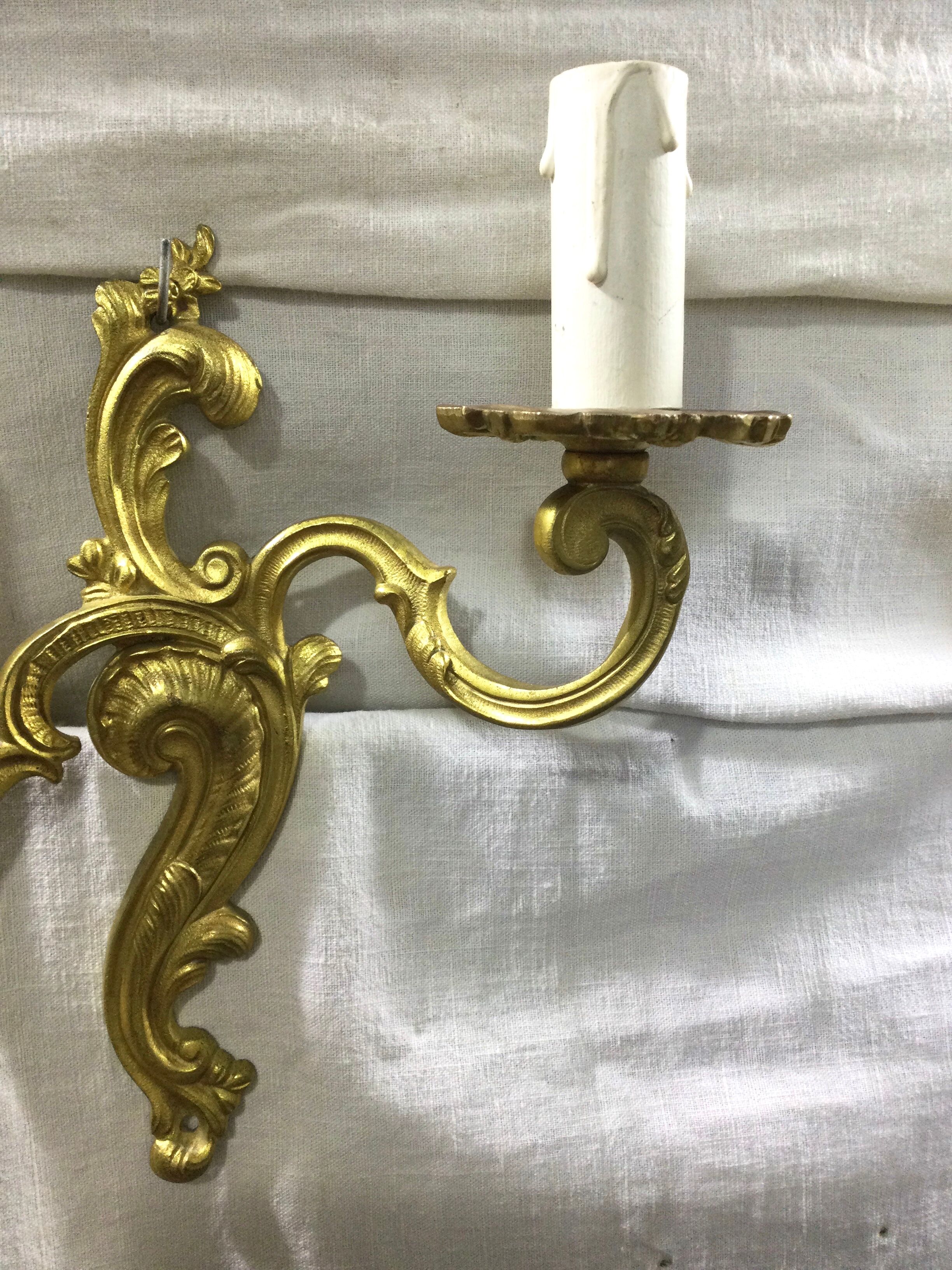 Pair of Louis XV style bronze sconces
