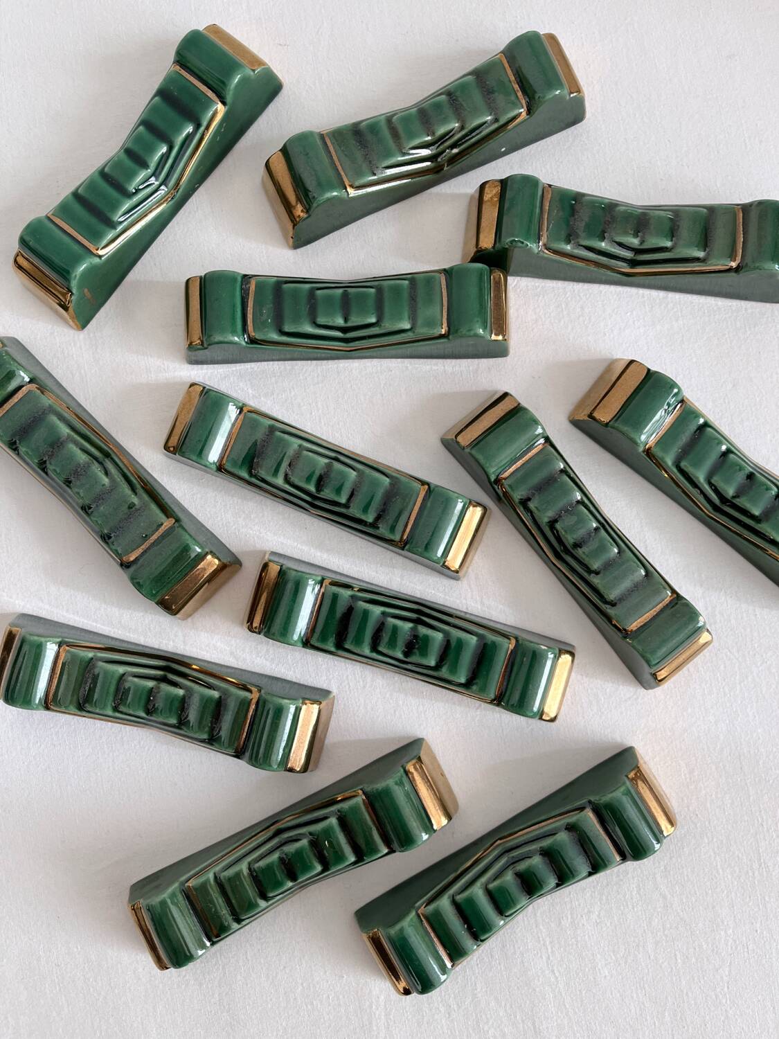 12 vintage green and gold ceramic knife holders from the 50s