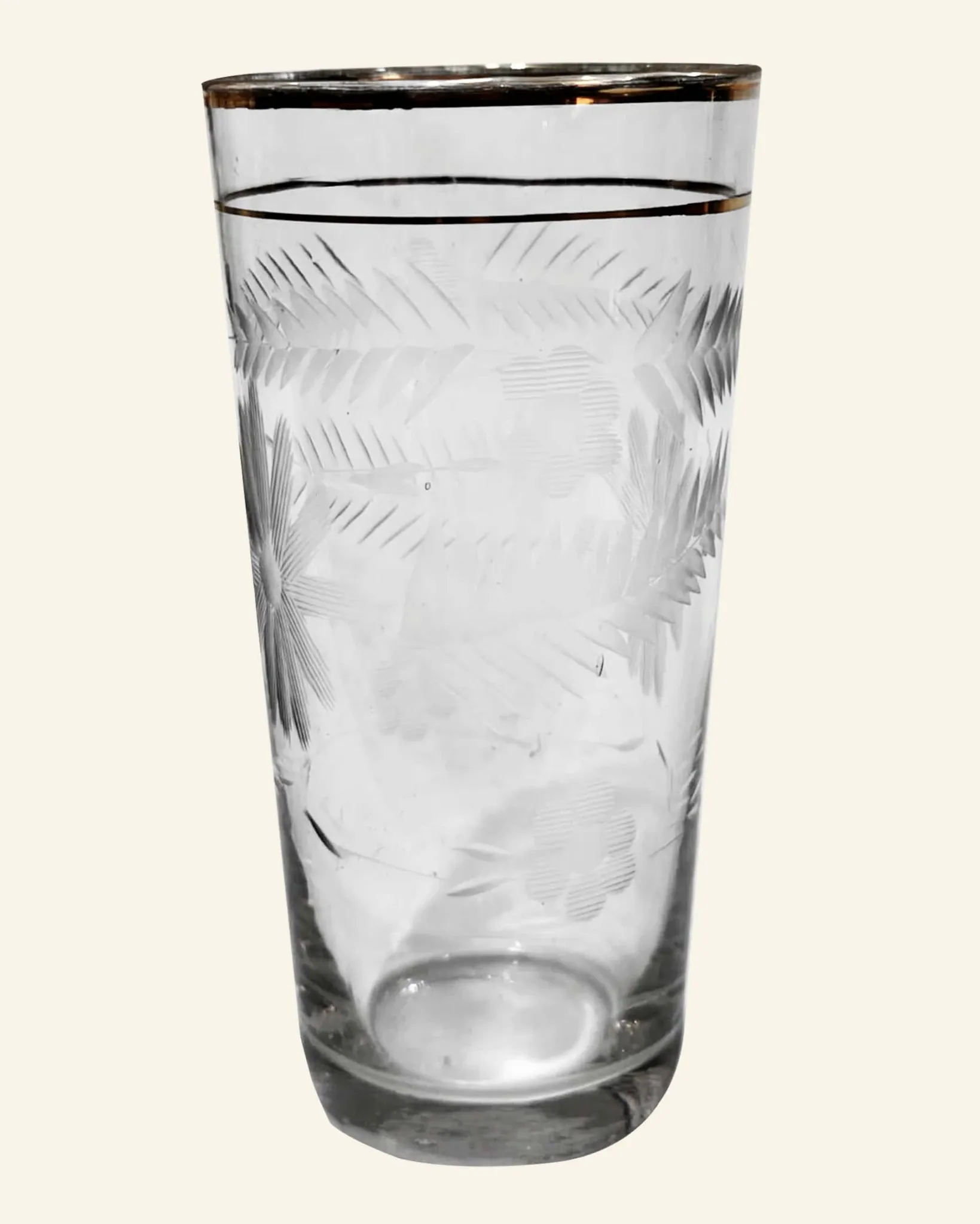 Four engraved crystal glasses from La Granja, with gilded edges, early 20th century.