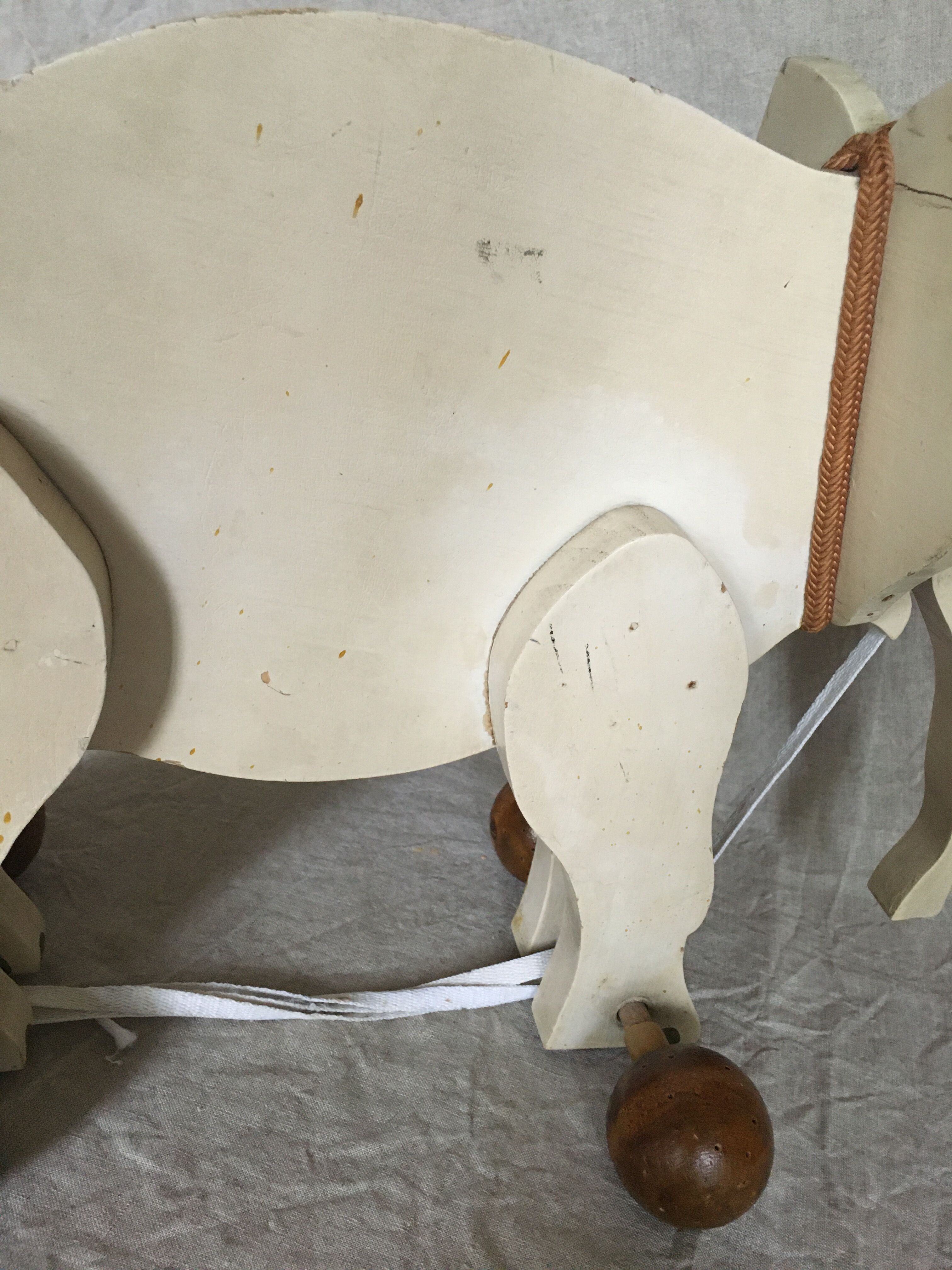 Wooden elephant on wheels