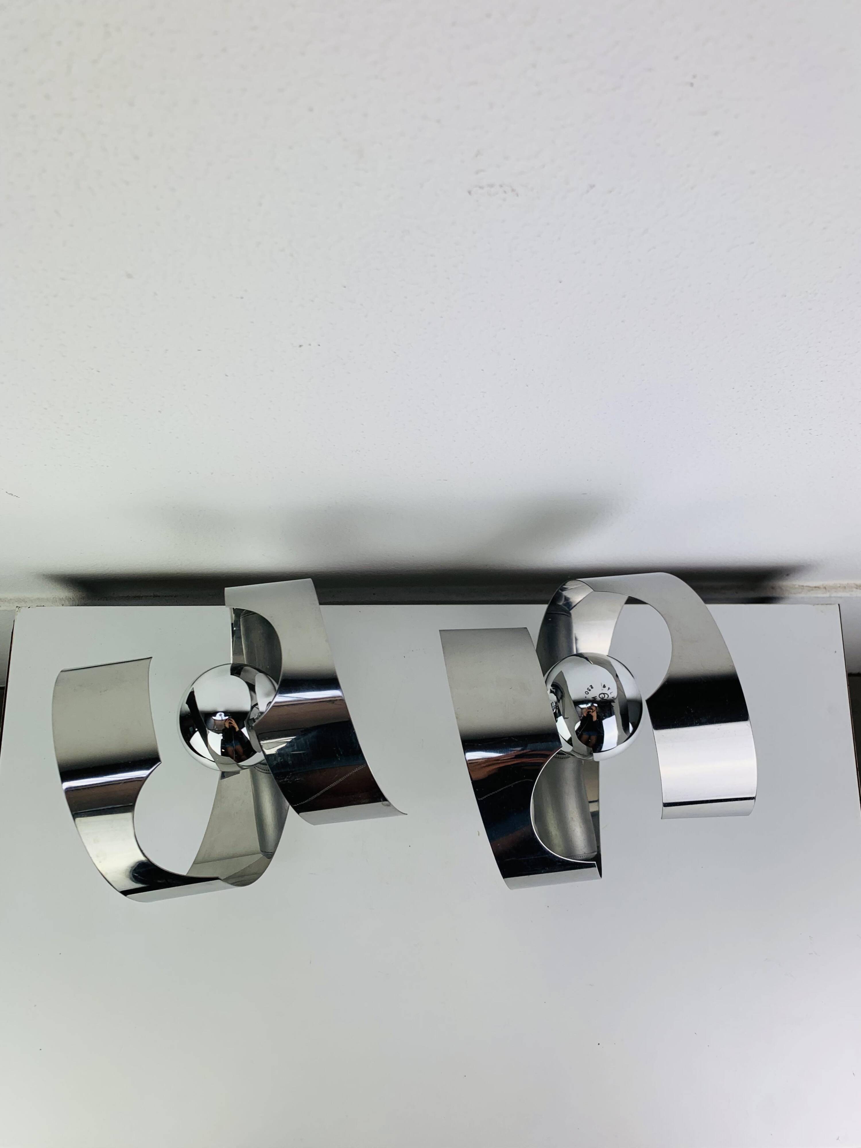 Pair of chrome spiral wall lights from the seventies/Space Age, 1970s.