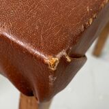 Small stool or footrest in wood and leather