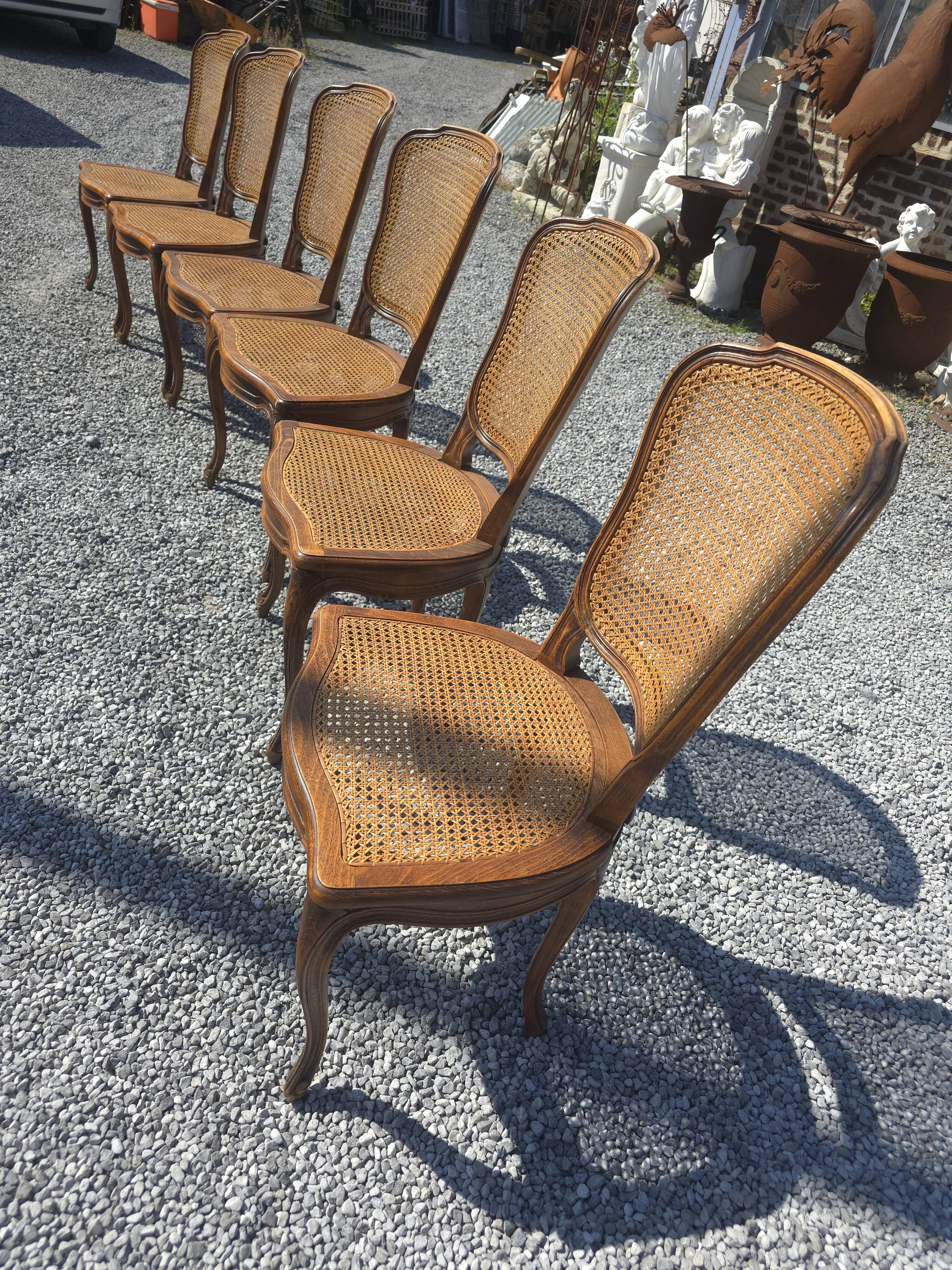 6 caned beech chairs