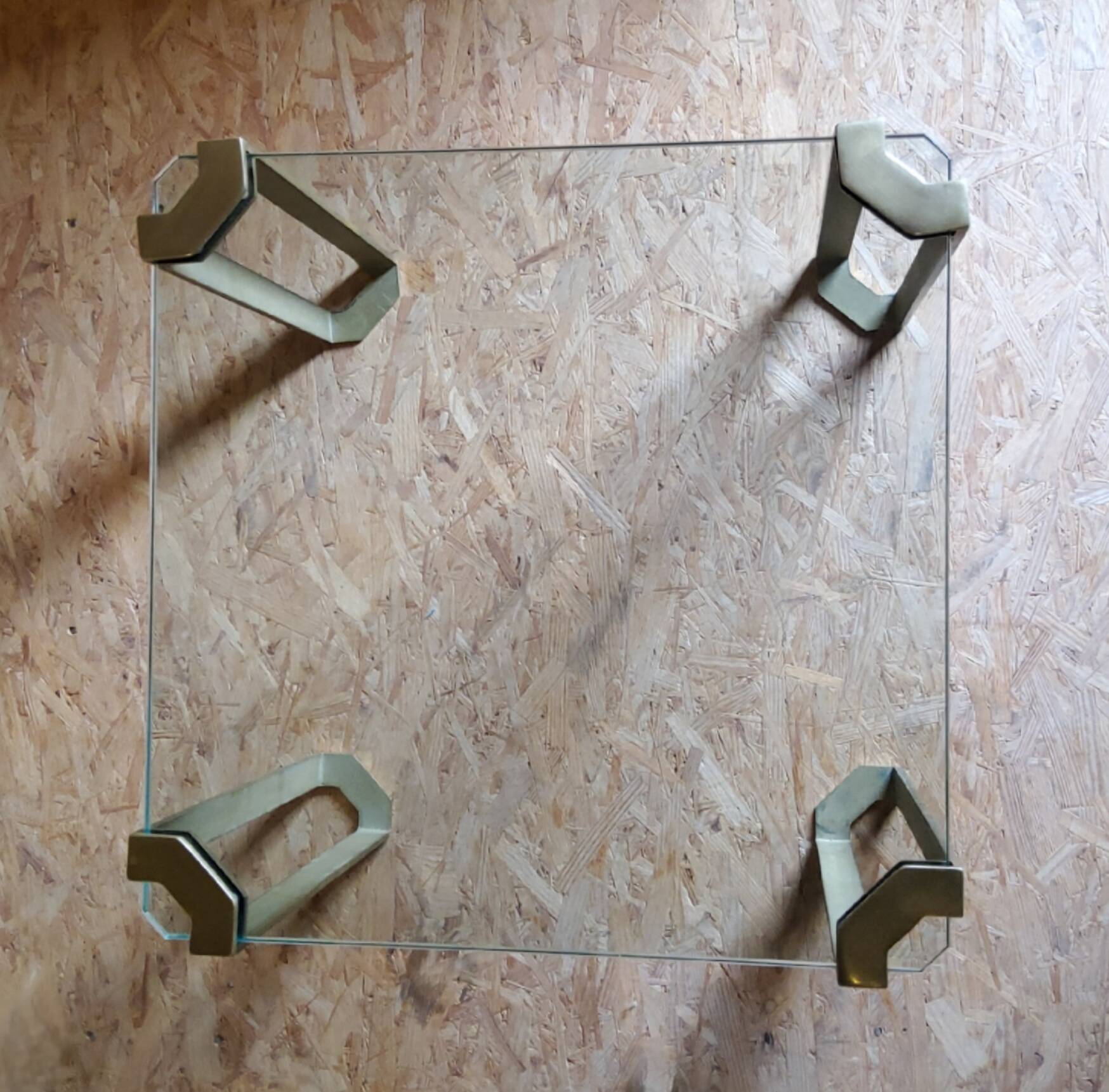 Glass and brass coffee tables by Peter Ghyczy