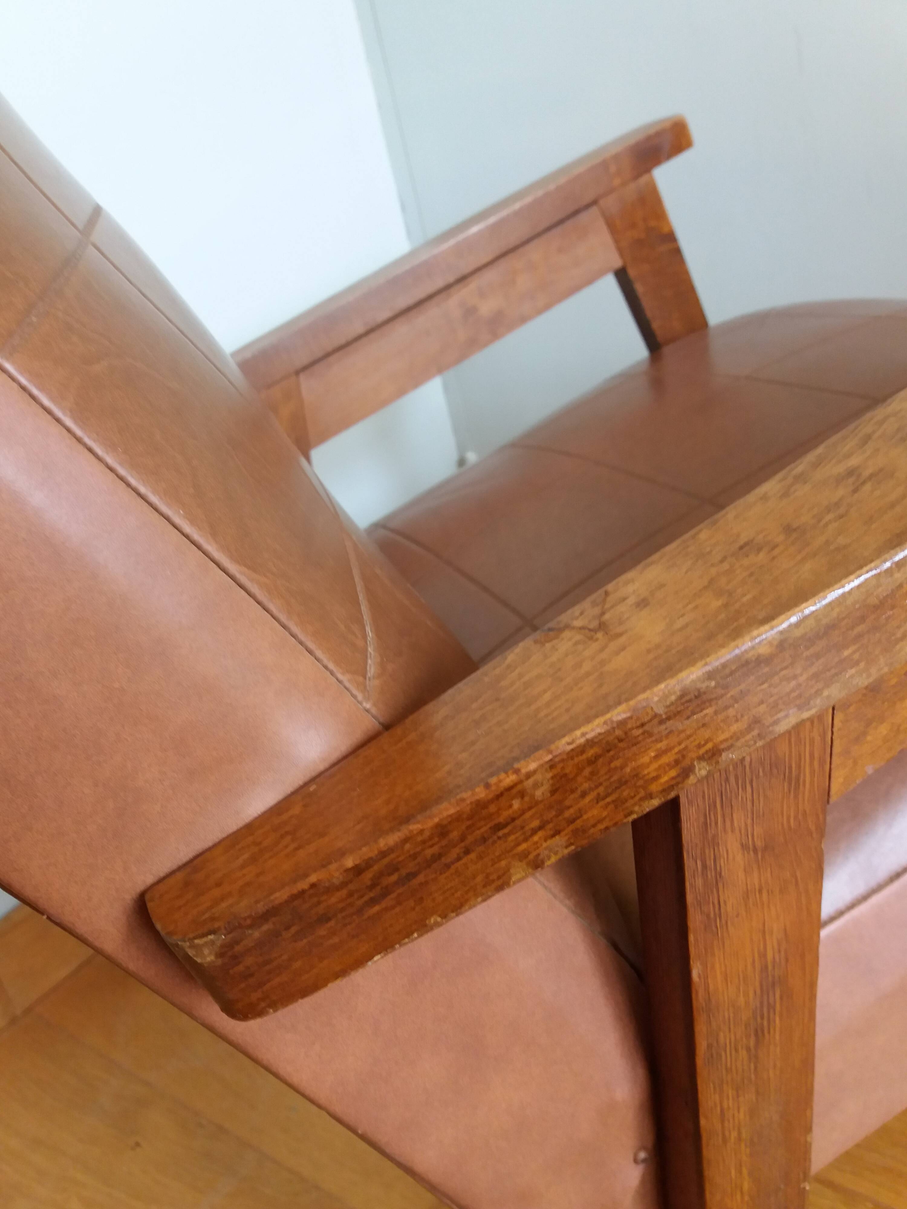 Scandinavian brown skai and wood armchair