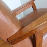 Scandinavian brown skai and wood armchair