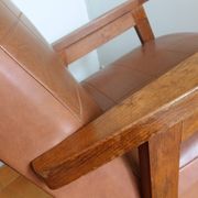 Scandinavian brown skai and wood armchair