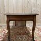 Louis XV style coffee table in cherry wood.