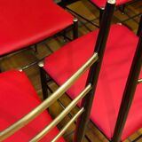 Six steel and brass chairs attributed to Carlo de Carli