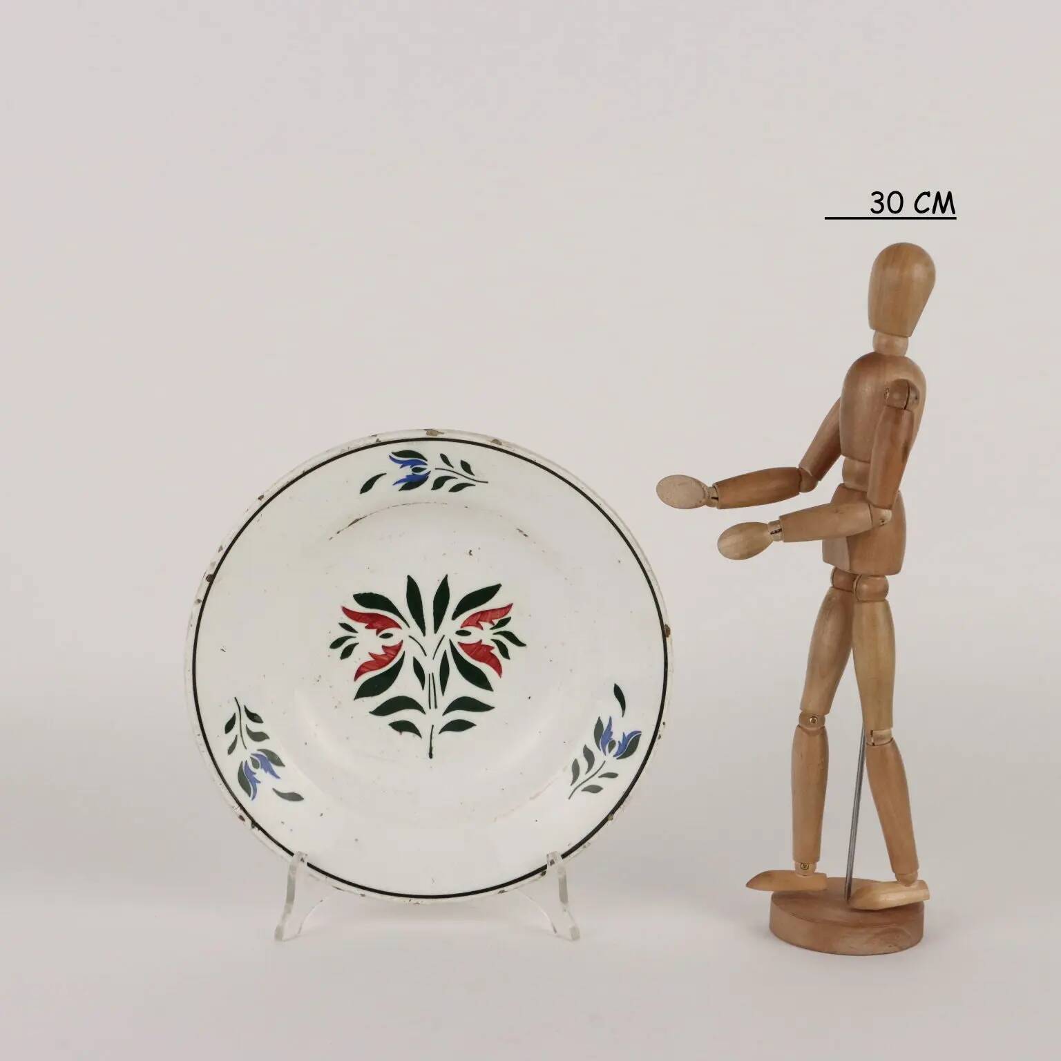Antique ceramic plate made in France, early 20th century.