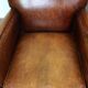 Set of 2 subtle sheepskin leather armchairs with a beautiful warm color scheme