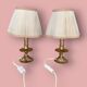 Pair of bedside or side fish lamps in gilded brass