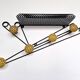 Black and yellow wall coat rack, France