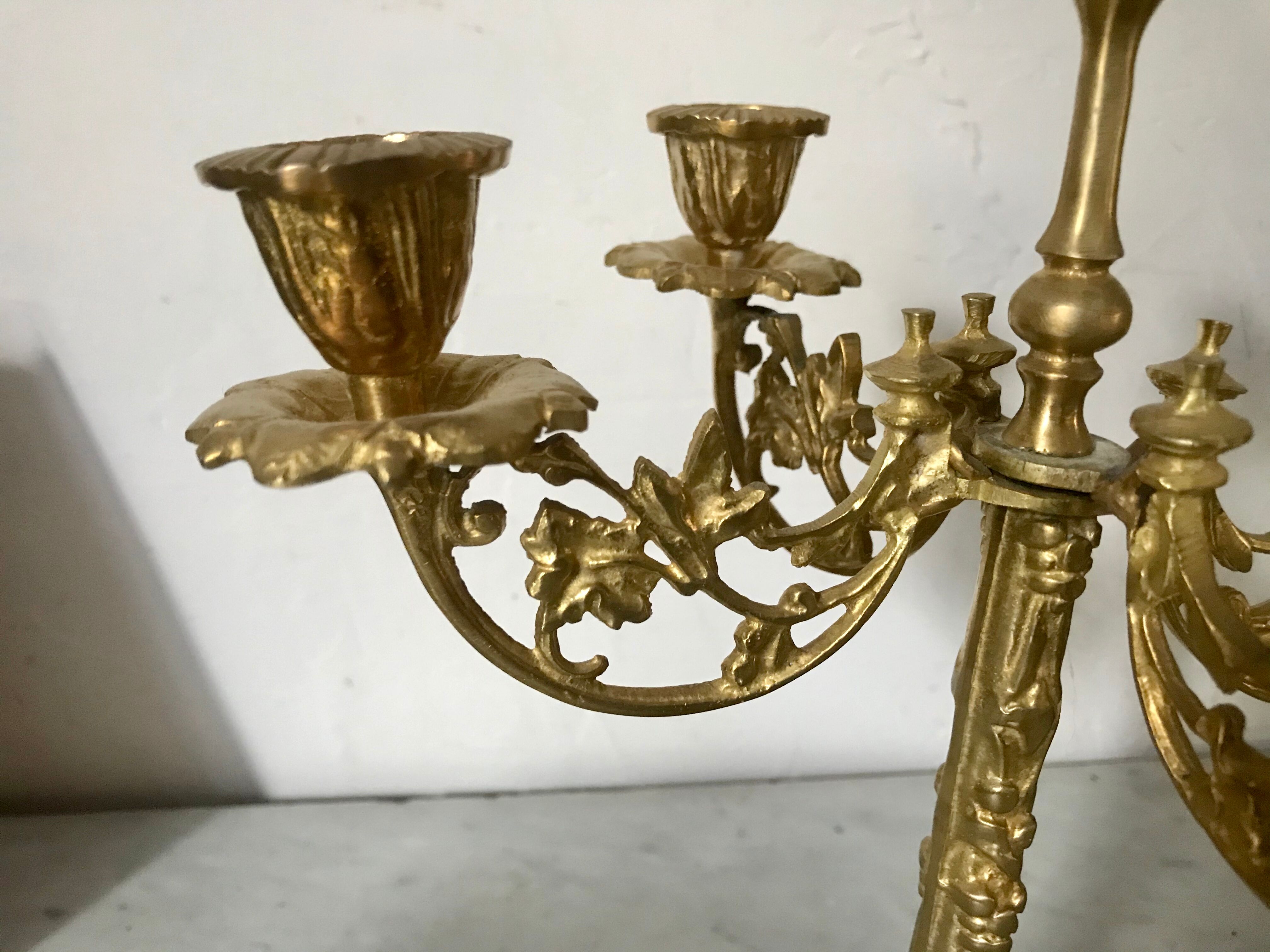Pair of golden brass candlesticks