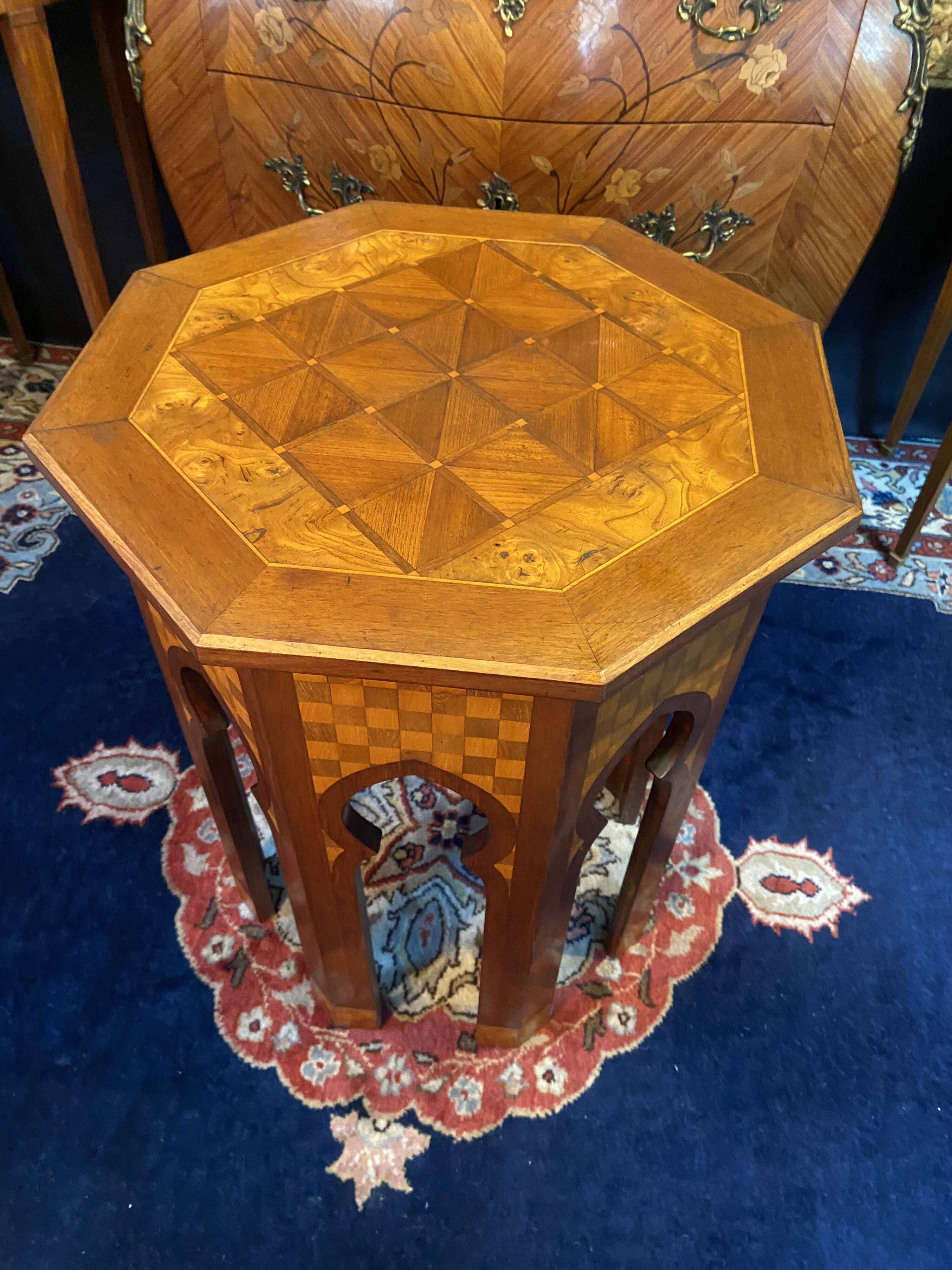 Thuyawood tea table with marquetry decoration.