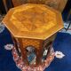 Thuyawood tea table with marquetry decoration.