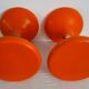 2 orange diabolo stools from the 70s