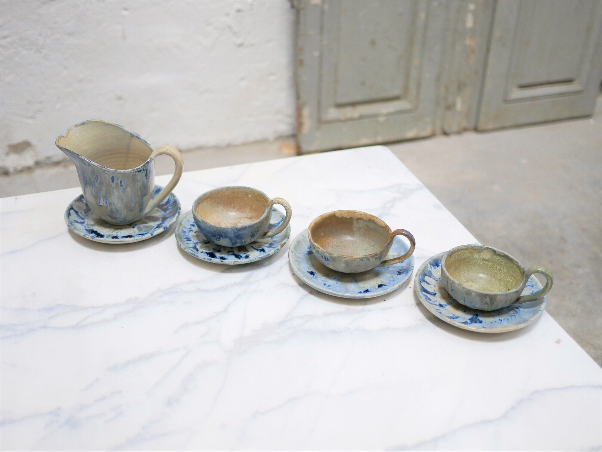 Series of 3 cups, a milk jar and 4 antique porcelain saucers