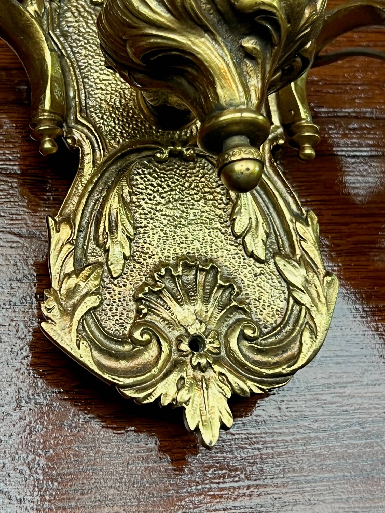 Pair of Louis XV style wall lights. Solid gilded bronze.