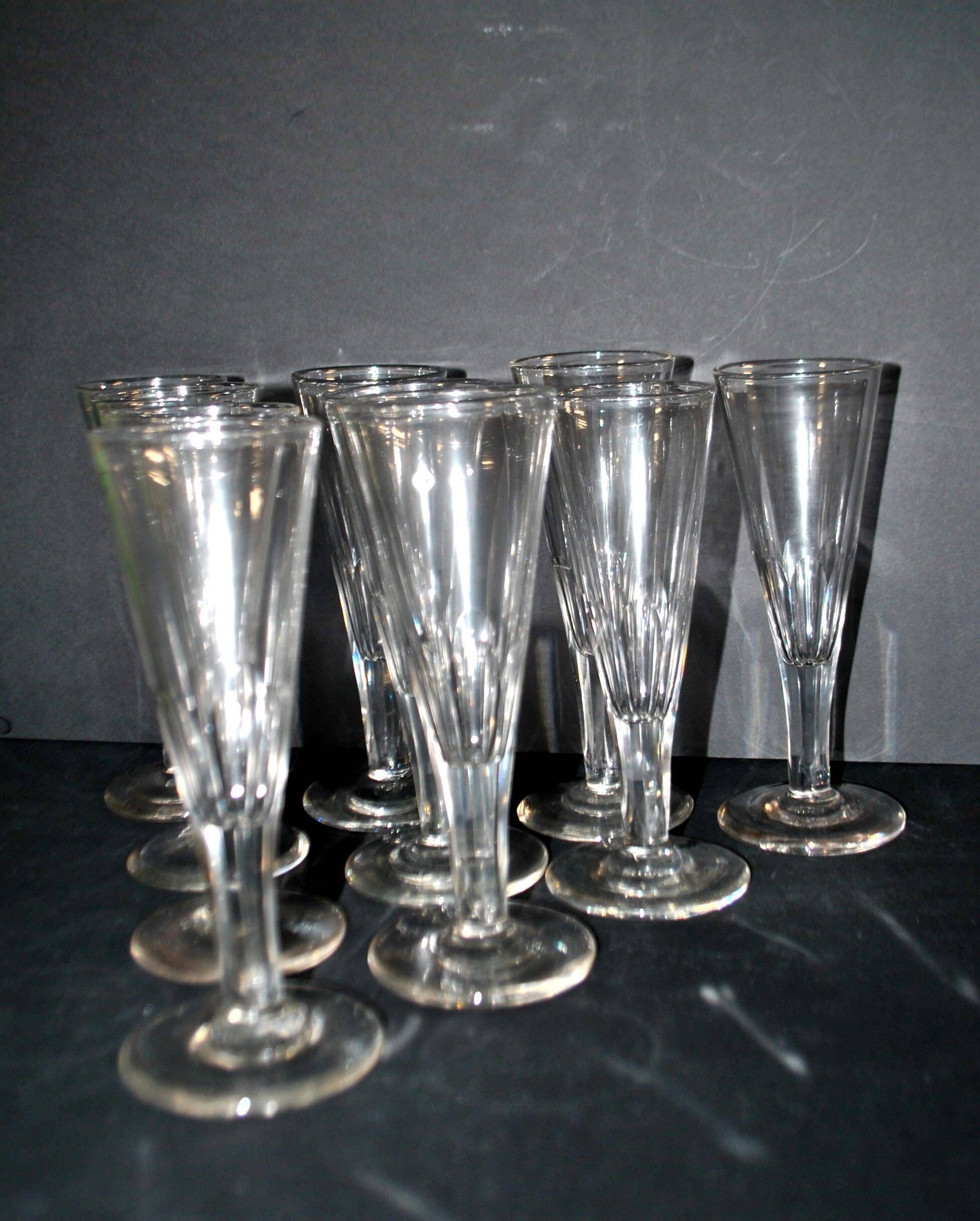 Portieux? Meisenthal? Set of 10 cut glass champagne flutes with flat sides from 1900.