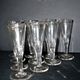 Portieux? Meisenthal? Set of 10 cut glass champagne flutes with flat sides from 1900.