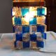 1970s designer table lamp with blue and clear plexiglass pendants.
