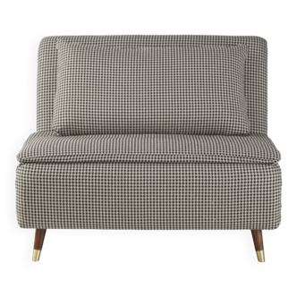 Compact sofa bed with houndstooth pattern