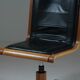 Office armchair in beech and black leather for Cofemo, Italy
