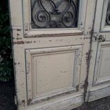 Porte d'entrée cintrée double en chêne, grilles et verre, XIXème