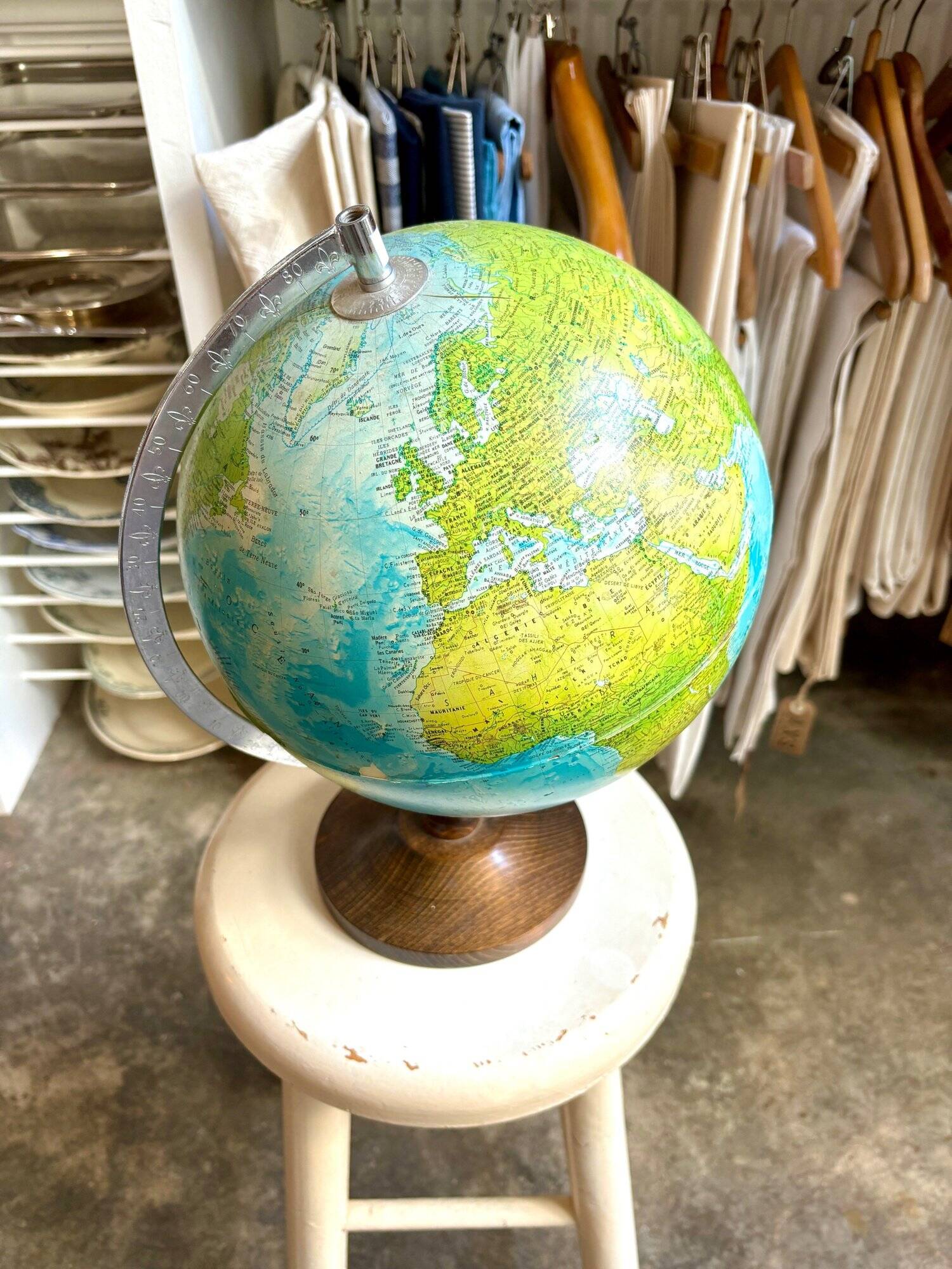 World map, globe with wooden base