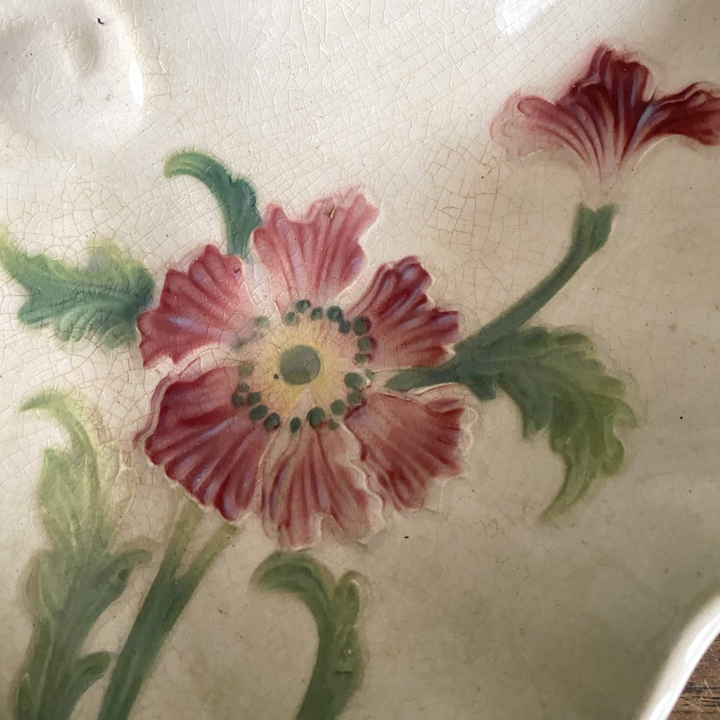 Art Nouveau slip dish with poppy decoration