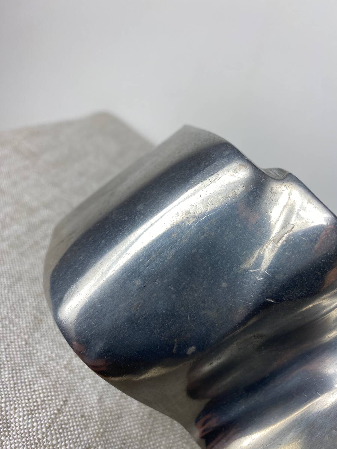 Brushed aluminum candle holder