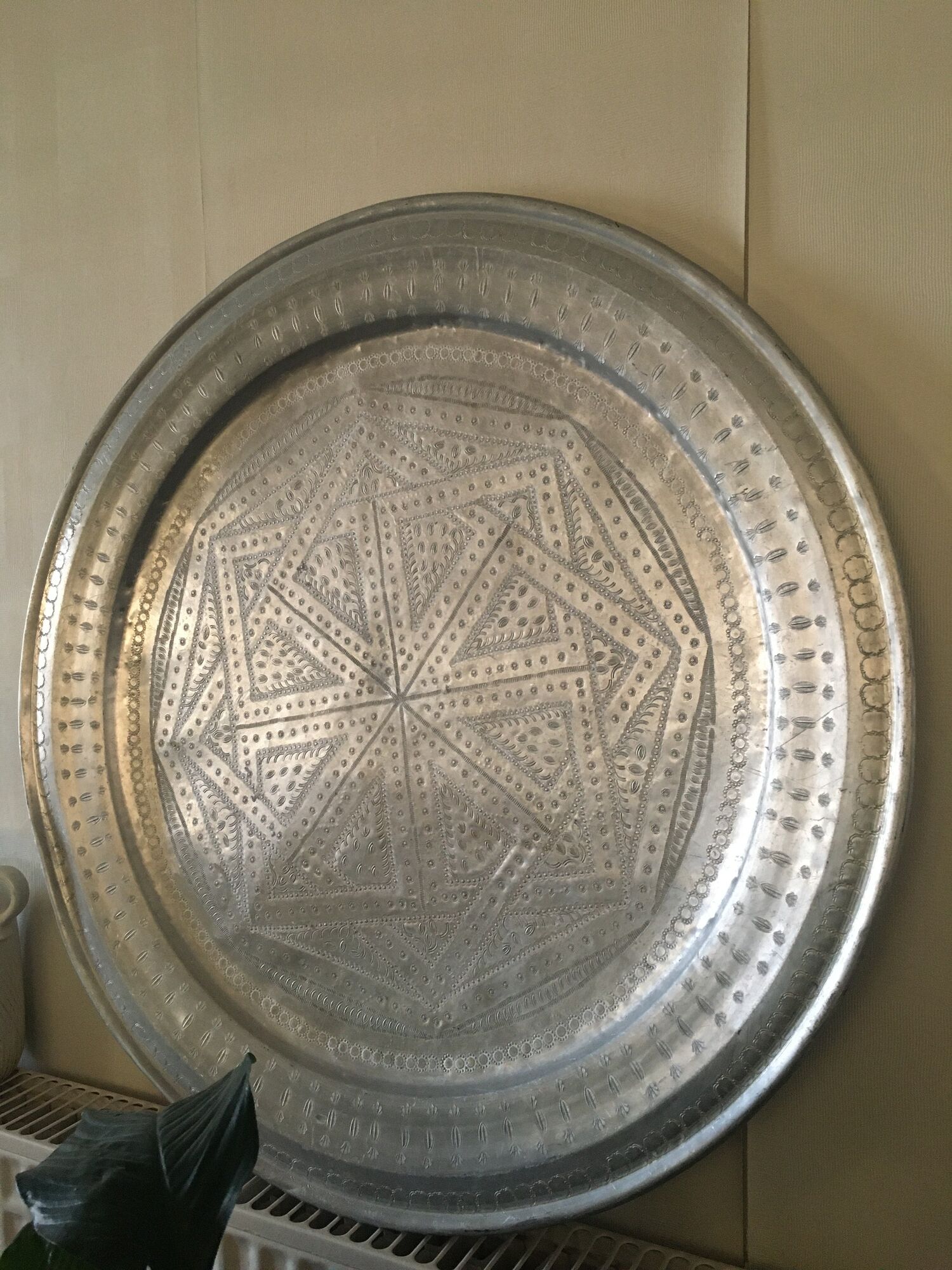 Moroccan aluminum tray on wooden tripod