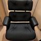 Fauteuil et ottoman Charles Eames en bois de palissandre et cuir
