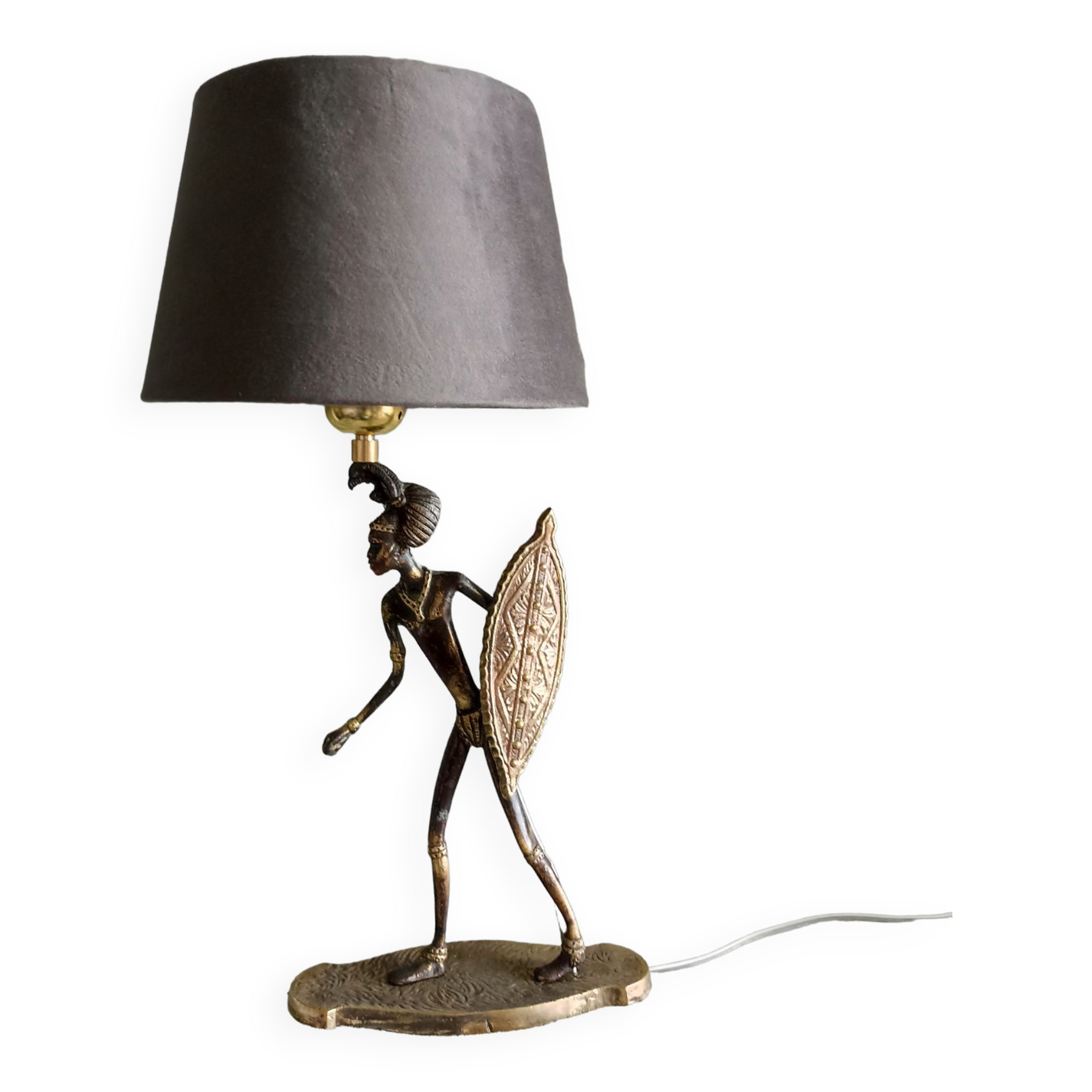 African warrior lamp in bronze.