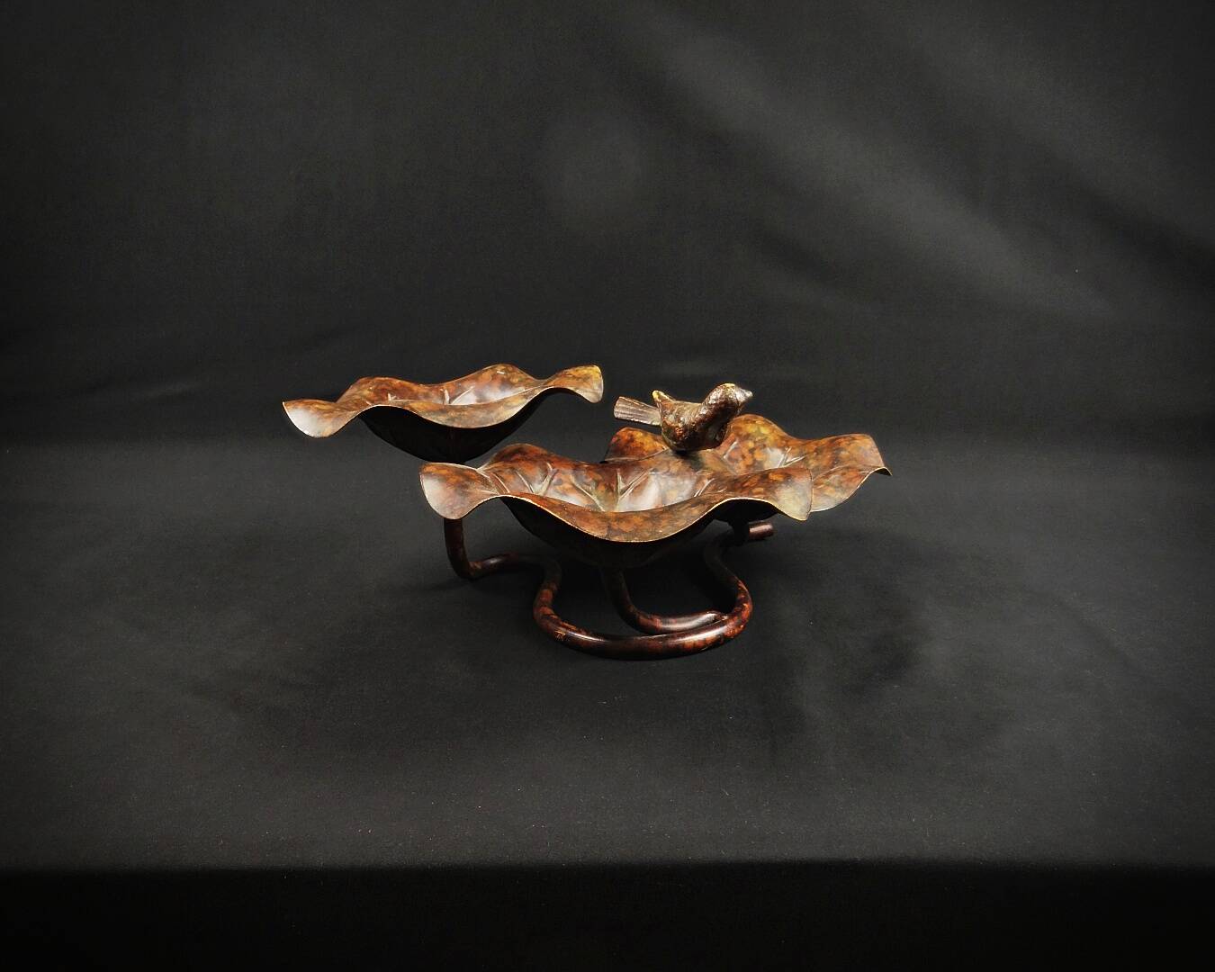 Three-tiered lotus leaf shaped patinated metal bird bath